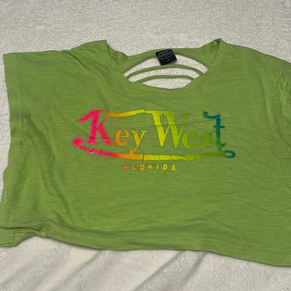 Key west cropped neon green shorts with slits in the back